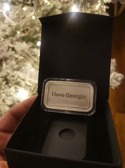 31.15 გრამიამი 999.9 სინჯის ვერცხლის ქარხნისიერ დაბეჭდილი ზოდი, გრავირებით